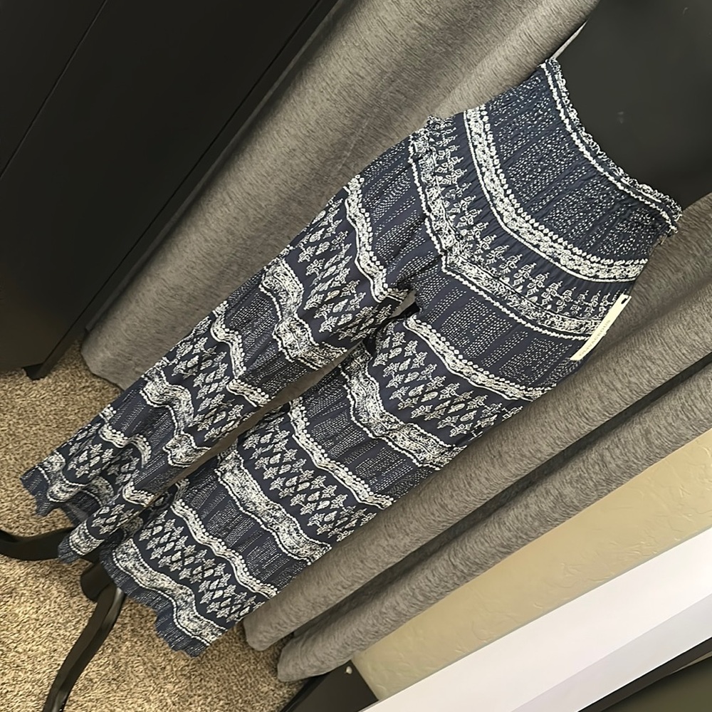 NWT multi print pants S. Never worn. They were too small for me.